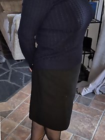 A blonde beauty enjoys wearing nylon stockings.