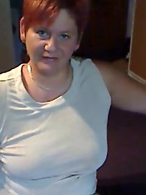 Cock addicted older female is posing undressed