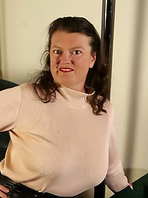 Cute tattooed babes are having a good time with a large penis