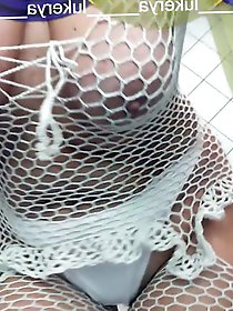 Old body of sexy Lukerya in white fishnet with visible nippl