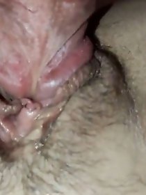 Stroking cock against clitoris