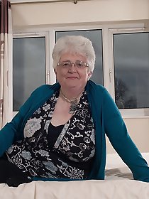 Naughty big breasted british granny getting frisky