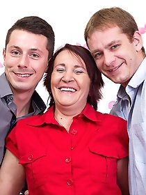 Two guys sharing a naughty mature lady