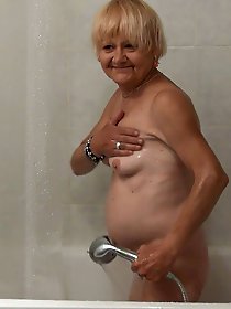 Small-sized Mila enjoys her water playtime