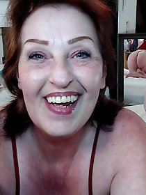 Experienced dominant woman prepares for sexual encounter